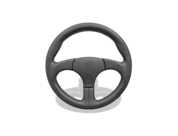 Sports steering wheel without airbag in Black with embossed Porsche logo for Porsche 928 Sports steering wheel without airbag in Black with embossed Porsche logo for Porsche 928 zoom